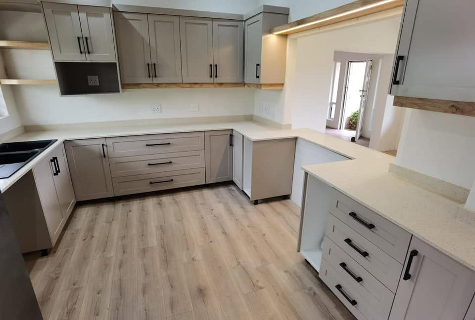 Custom manufactured kitchen cupboards with stone tops